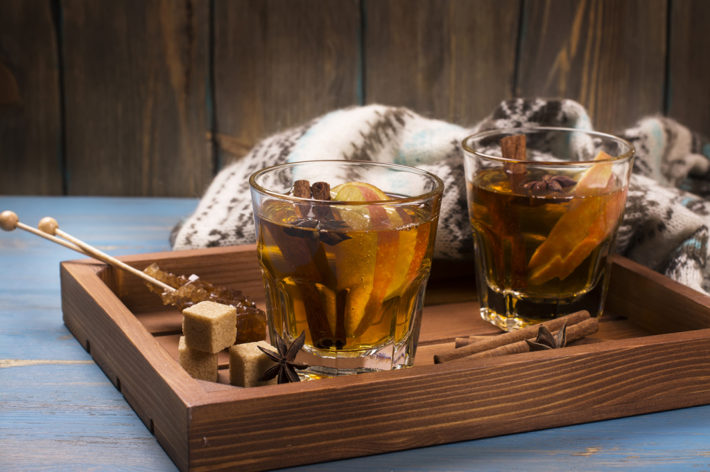 Winter drink. Warm mulled apple cider with spices