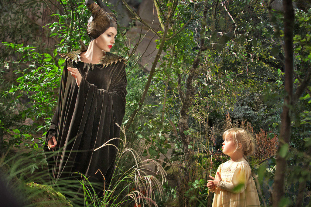 Disney's MALEFICENT L to R: Maleficent (Angelina Jolie) and Young Aurora (Vivienne Jolie-Pitt) Ph: Frank Connor ©Disney Enterprises, Inc. All Rights Reserved.